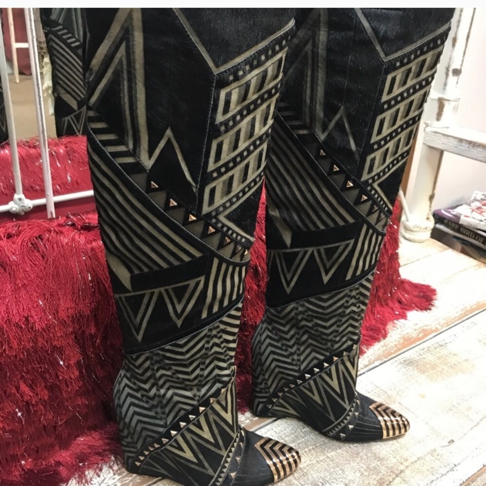 Ivy Kirzhner knee boots.